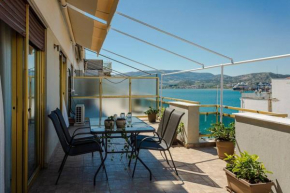 Cozy seaside penthouse with sea & mountain view.